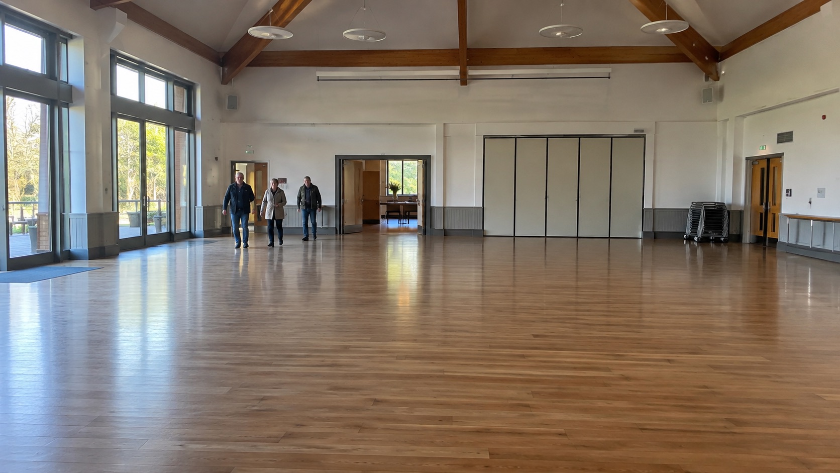 People entering a hall in an illustrative recording